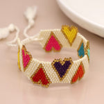 White bead and bold hearts bracelet 3986