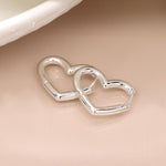 Silver plated heart shaped hoop earrings