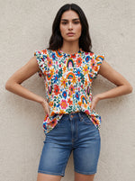The 'Flower Power' Smocked Peplum Top