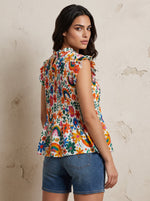 The 'Flower Power' Smocked Peplum Top