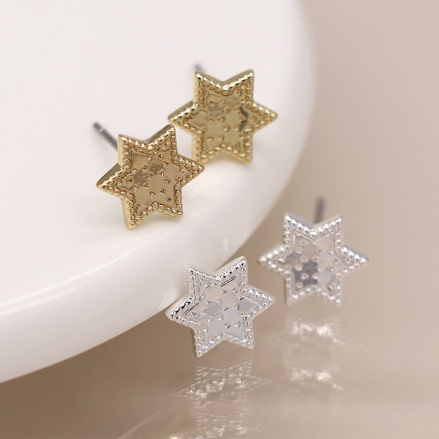 Silver plated and golden textured star stud earrings