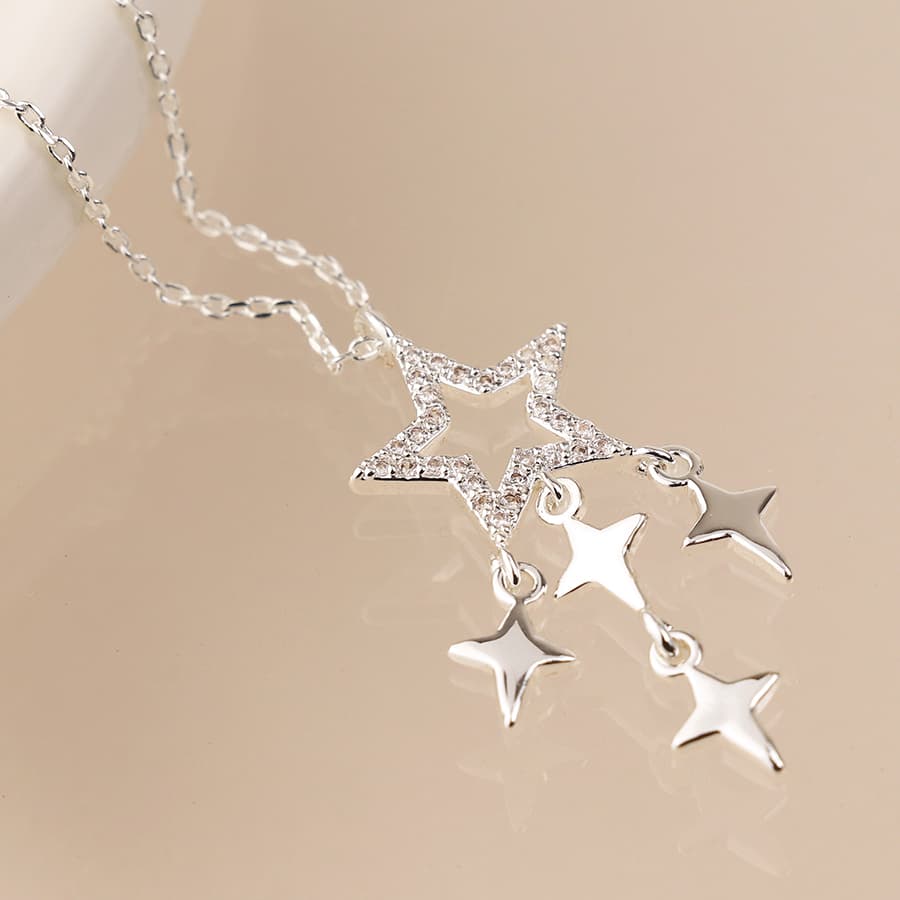 Silver plated crystal star and star drops necklace