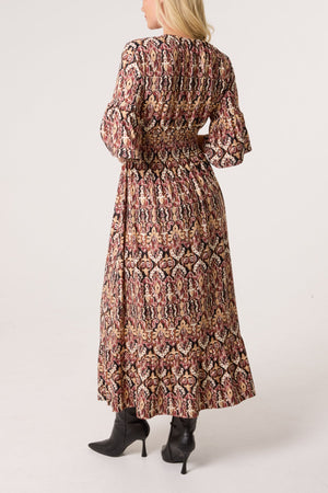 AZTEC PRINT SHIRRED WAIST STRETCH DRESS
