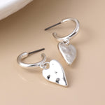 Silver plated worn finish heart hoop earrings