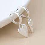 Silver plated worn finish heart hoop earrings