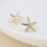 Golden single starfish stud earrings