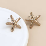 Golden single starfish stud earrings