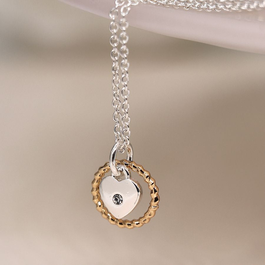 Silver plated necklace with heart and golden twist hoop 3909