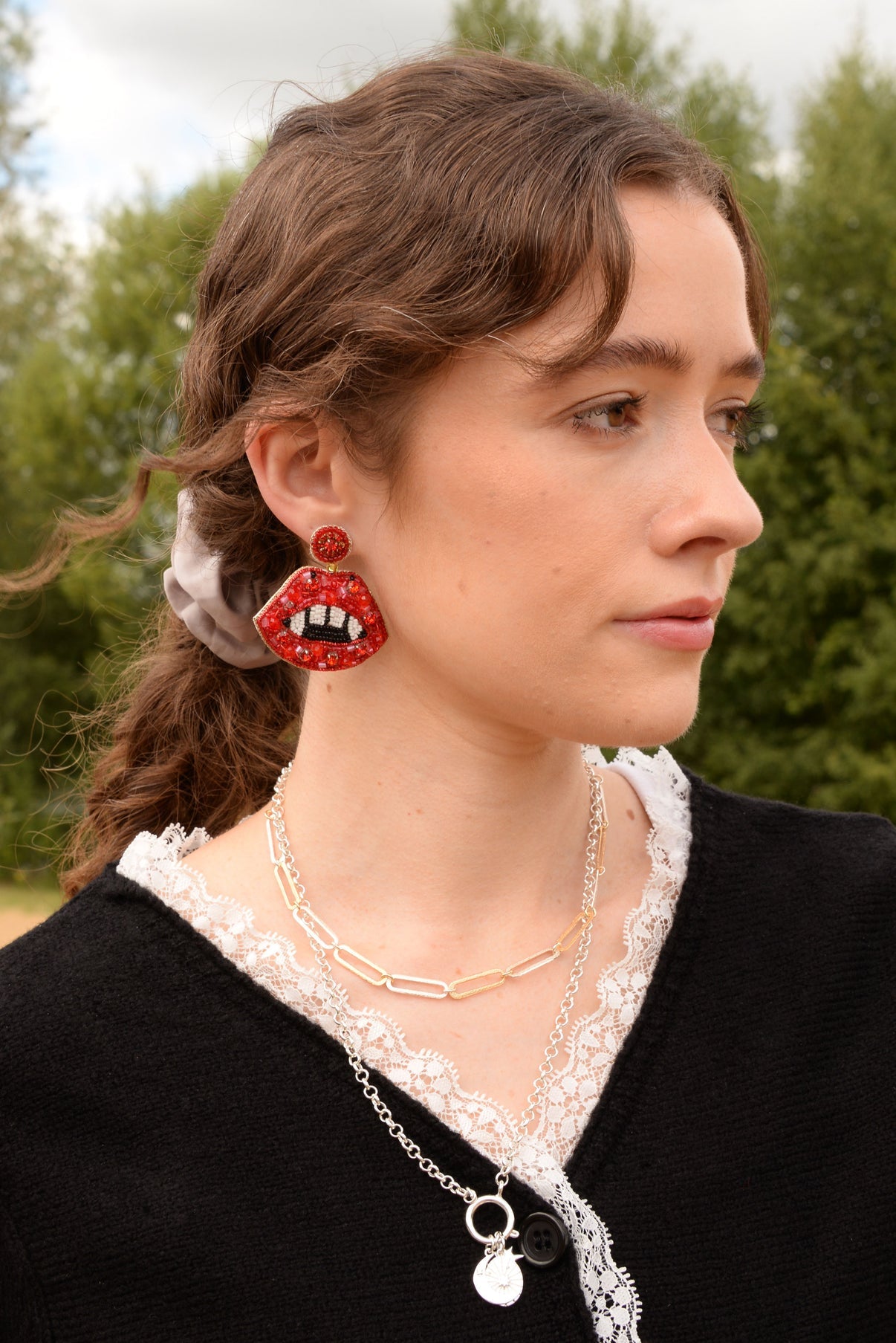 RED FANG LIP EARRINGS