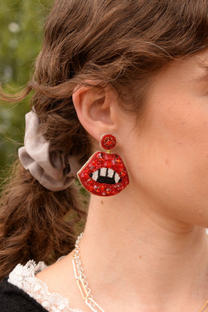 RED FANG LIP EARRINGS