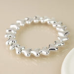 Silver plated polished hearts stretch bracelet