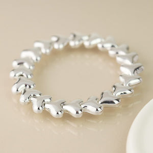 Silver plated polished hearts stretch bracelet