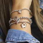Silver plated bead and heart charm t-bar bracelet