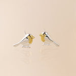 Sterling silver and gold robin stud earrings
