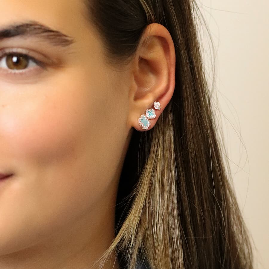 Silver plated blue quatrefoil triple stud set