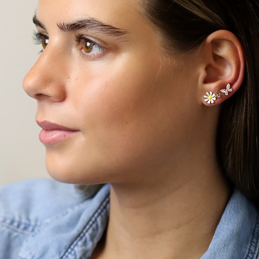 Golden triple flower and butterfly stud set