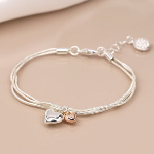 Triple chain bracelet with hearts