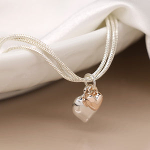 Triple chain bracelet with hearts