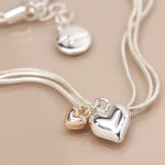 Triple chain bracelet with hearts