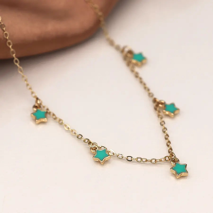 Golden chain and turquoise stars necklace