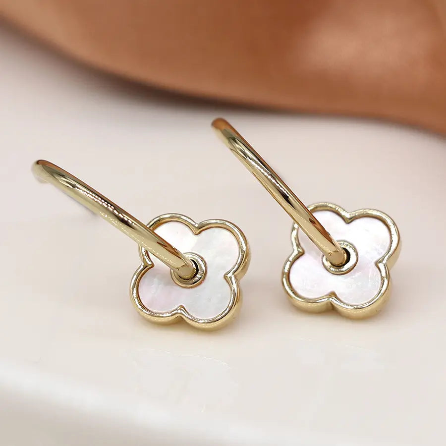 Golden c-hoop quatrefoil earrings