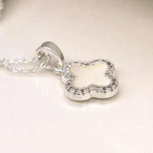 Silver plated crystal edged quatrefoil necklace
