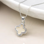 Silver plated crystal edged quatrefoil necklace