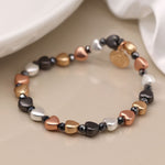 Mixed metallic heart bracelet with black beads 3737