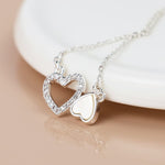 Silver plated topsy turvy hearts necklace