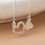Silver plated topsy turvy hearts necklace