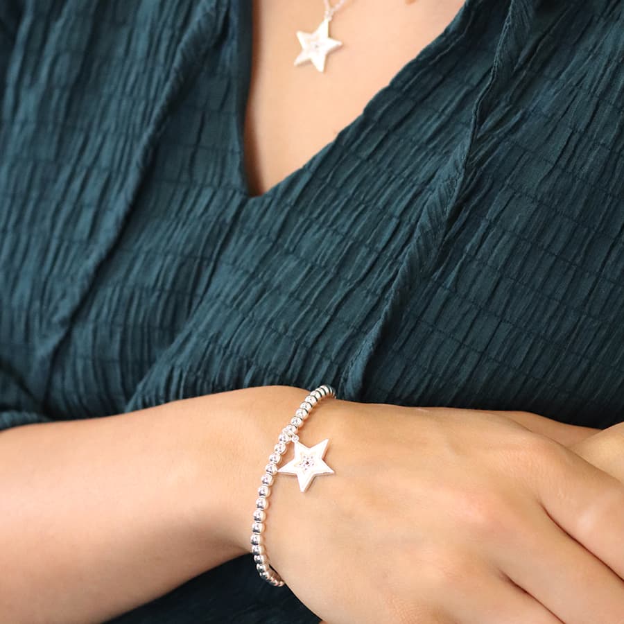 Silver plated and shell star bracelet with crystal centre