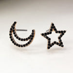 Faux gold mismatched star and crescent moon earrings with black crystals
