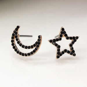 Faux gold mismatched star and crescent moon earrings with black crystals