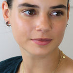 Faux gold mismatched star and crescent moon earrings with black crystals