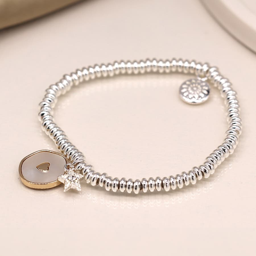 Silver plated mop heart disc and crystal star bracelet