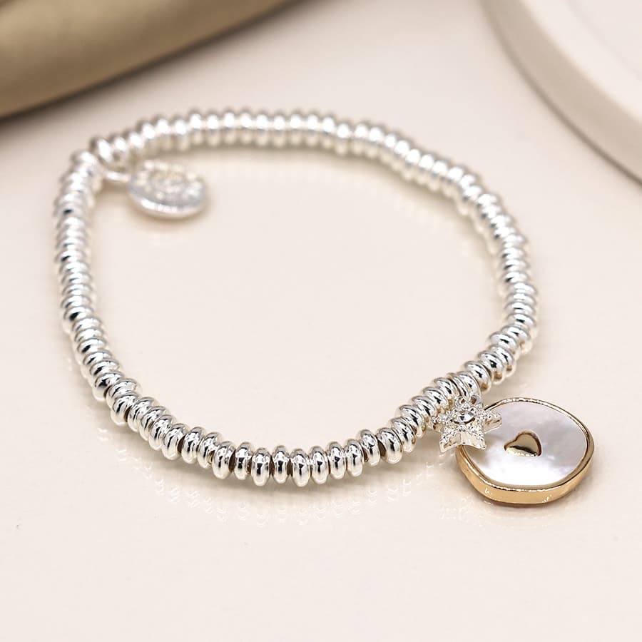 Silver plated mop heart disc and crystal star bracelet