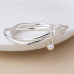 Silver plated bangle stack with ball charm