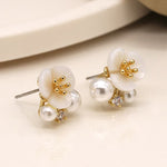 Faux gold plated flower pearl cluster studs