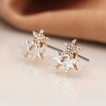 Faux gold and silver plated triple star stud earrings with crystals