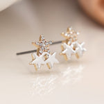 Faux gold and silver plated triple star stud earrings with crystals
