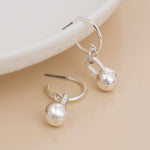 Silver plated c-hoop and ball charm earrings