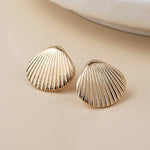 Golden clam shell stud earrings