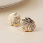 Golden clam shell stud earrings
