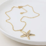 Golden starfish necklace