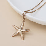 Golden starfish necklace
