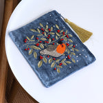 Blue velvet robin and embroidered holly zip purse