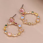 Golden decorative circle earrings with mixed crystals 4064