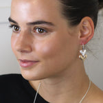 Silver plated and faux gold worn finish double heart drop earrings 4206