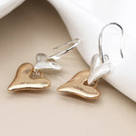 Silver plated and faux gold worn finish double heart drop earrings 4206