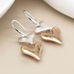 Silver plated and faux gold worn finish double heart drop earrings 4206